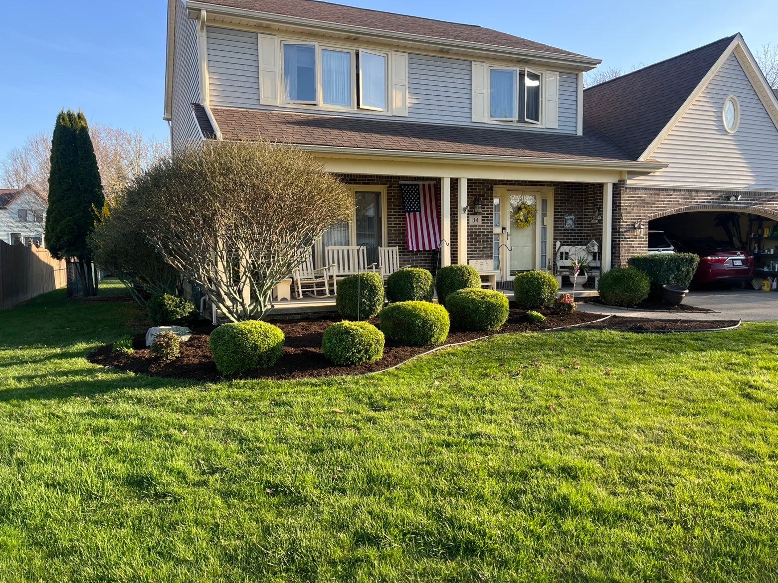 Premium hardscape patio at dusk in Buffalo backyard